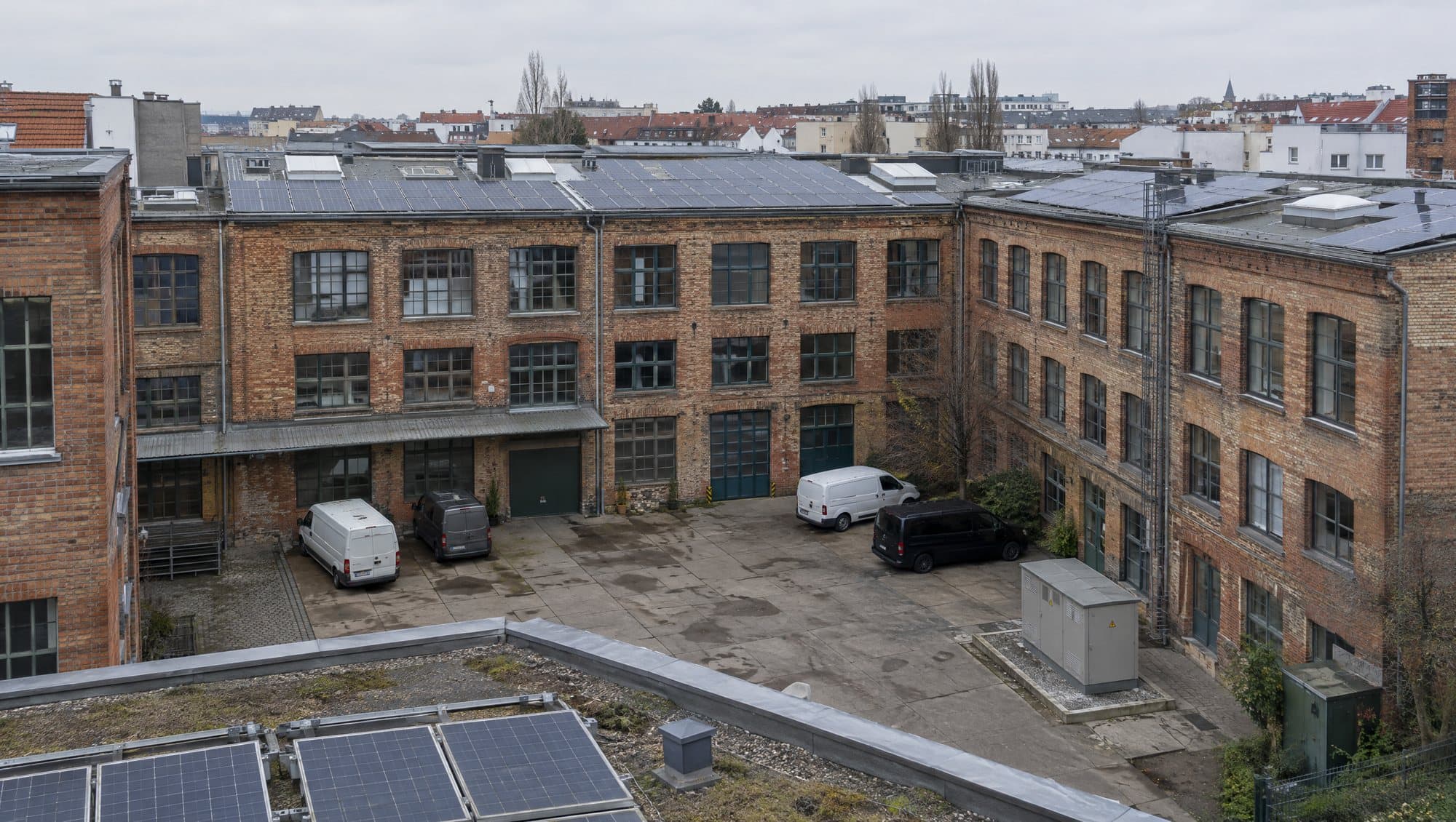 Berlin commercial courtyard complex with solar PV on the flat roofs